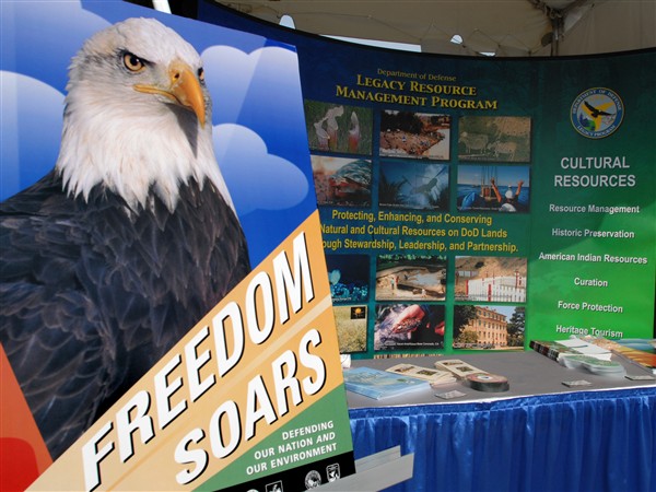 A Defense Department’s Legacy Resource Management Program display shows a table of information during the Bald Eagle Recovery and Final Delisting ceremony held at the Jefferson Memorial, June 28, 2007. The display was one of many in which provided natural and cultural resource information. Photo by Petty Officer 2nd Class Molly A. Burgess, USN